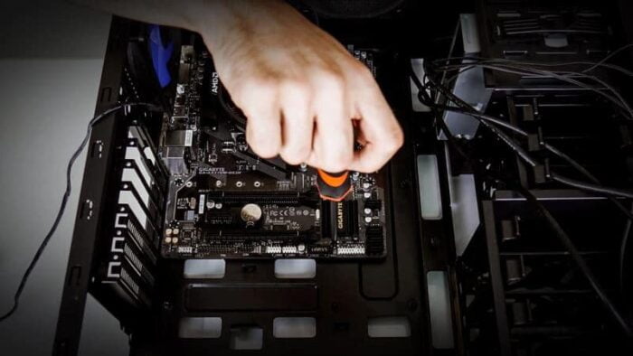 Screw-in the Motherboard Into the Place